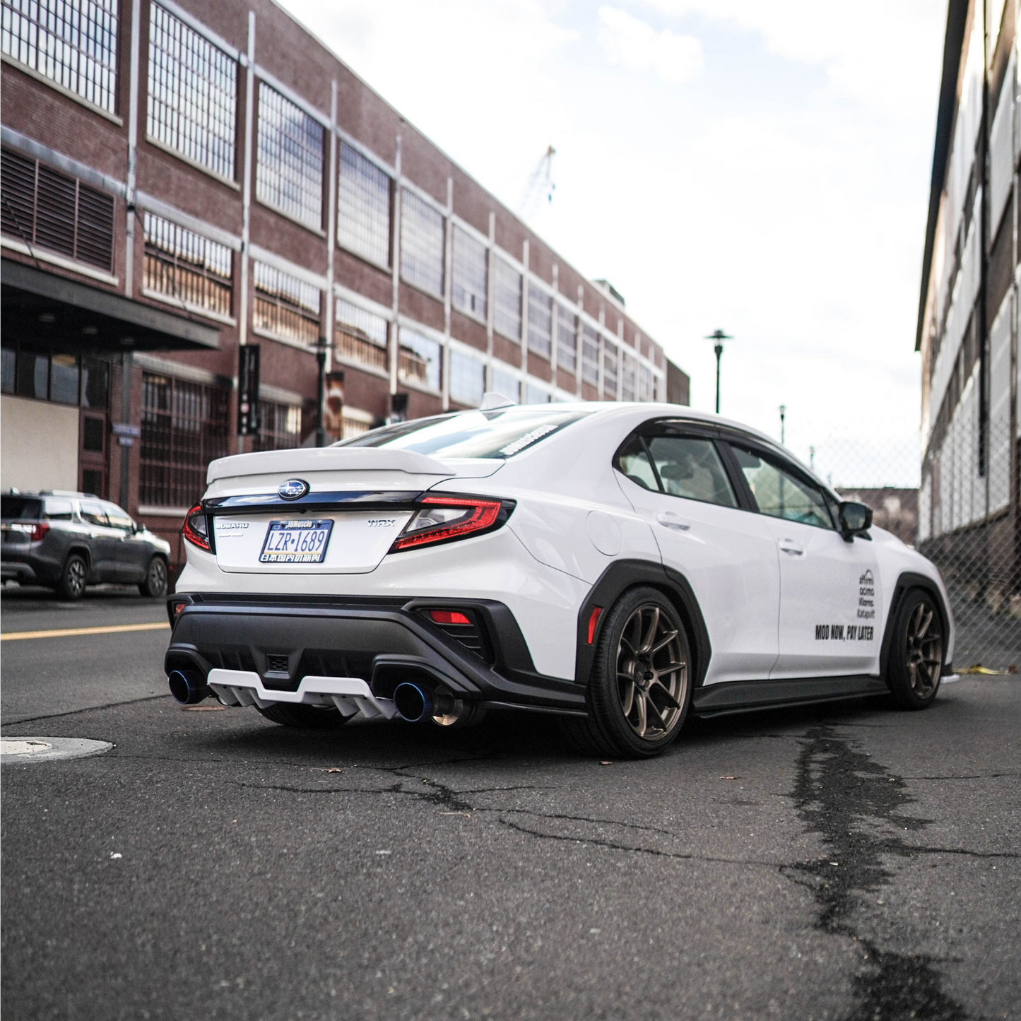 JDMuscle 22-25 WRX Duck Bill / Low Profile Spoiler - V1 Paint Matched / Gloss Black / Cherry Red