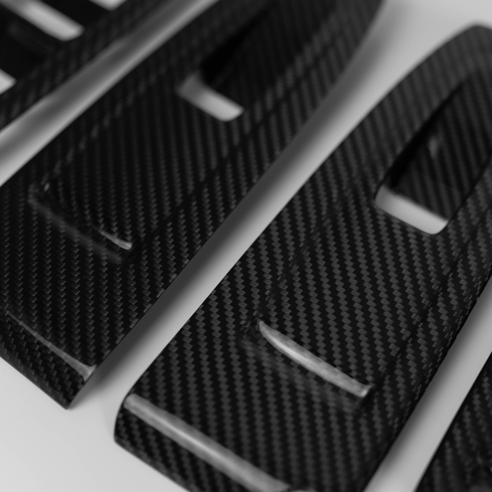 JDMuscle 22-25 WRX Tanso Dry Carbon Fiber Window Switch Cover with Gloss Finish