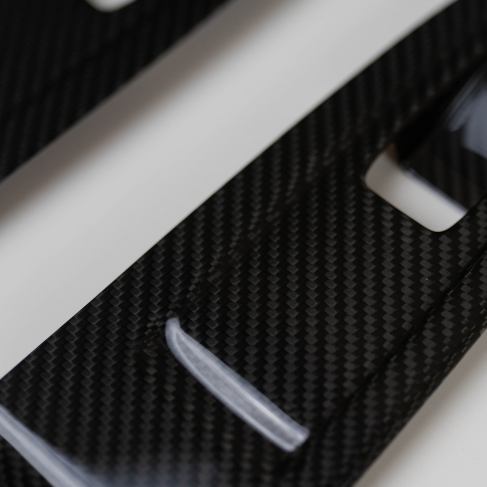 JDMuscle 22-25 WRX Tanso Dry Carbon Fiber Window Switch Cover with Gloss Finish