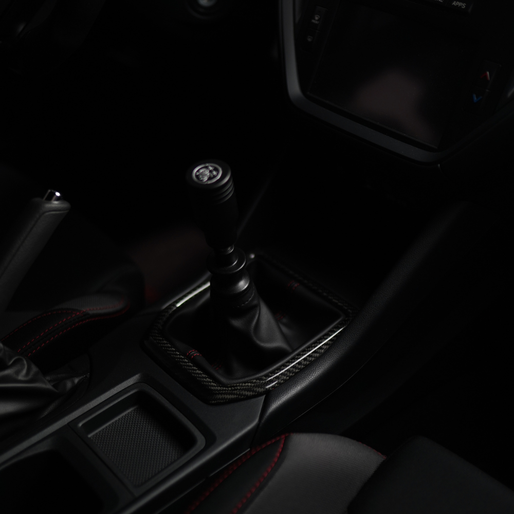 JDMuscle 22-25 WRX MT Tanso Dry Carbon Fiber Shifter Trim Cover w/ Gloss Finish