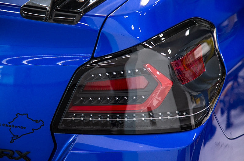 OLM Evolution Tail Lights (Clear Lens, Black Base, Red Bar) - 15+ WRX / STI