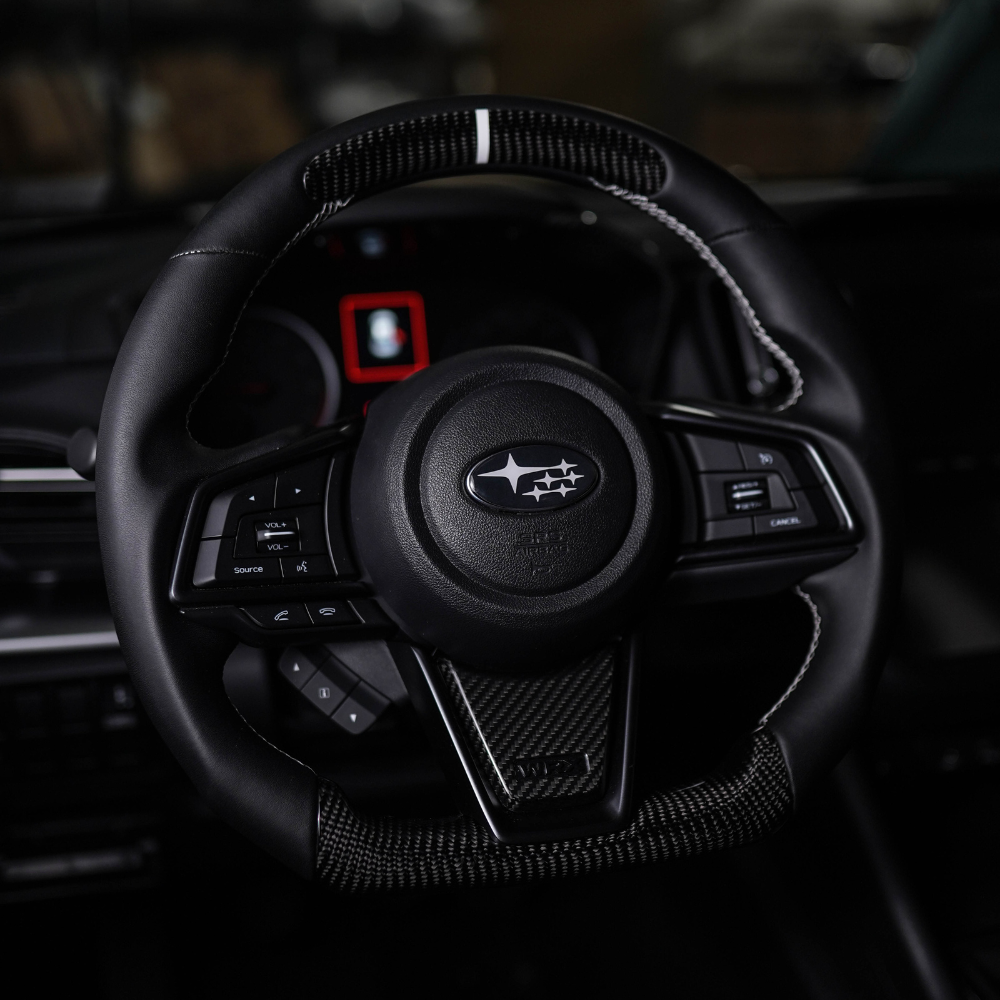 JDMuscle 22-25 WRX Tanso Carbon Fiber Steering Wheel Lower Trim Cover